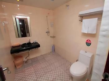 Jinzuan 100 Holiday Hotel Qufu Esterno foto